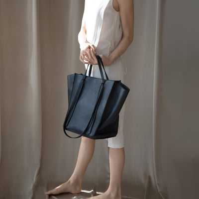 black cabas phantom leather tote bag #color_black