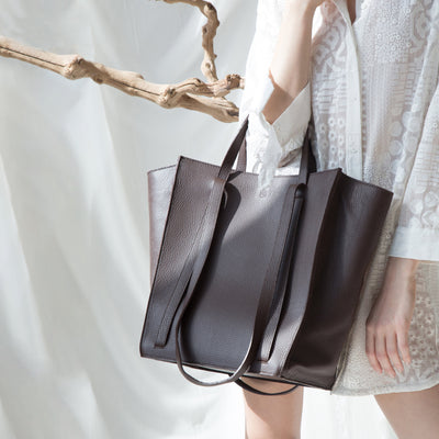 brown cabas phantom leather tote bag #color_chocolate